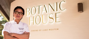 Botanical house with Luke Nguyen standing in chef outfit