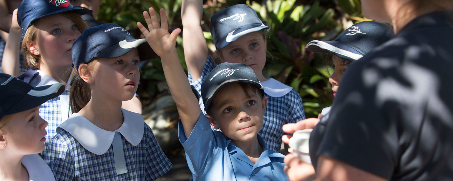 Children answering questions on a school tour in the Calyx