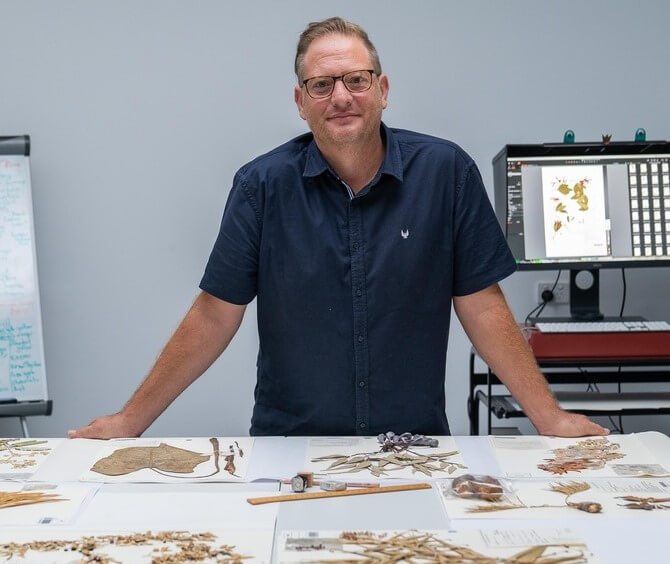 andre with plant specimens