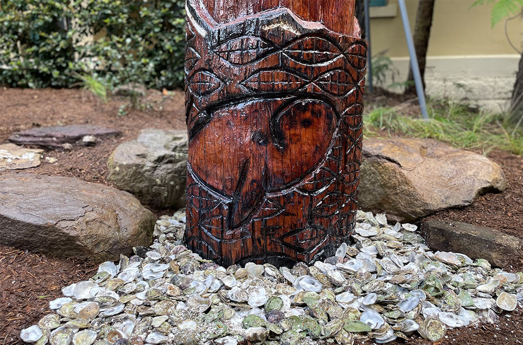 Whale carved into the base of the Yer'ung Spirit Tree