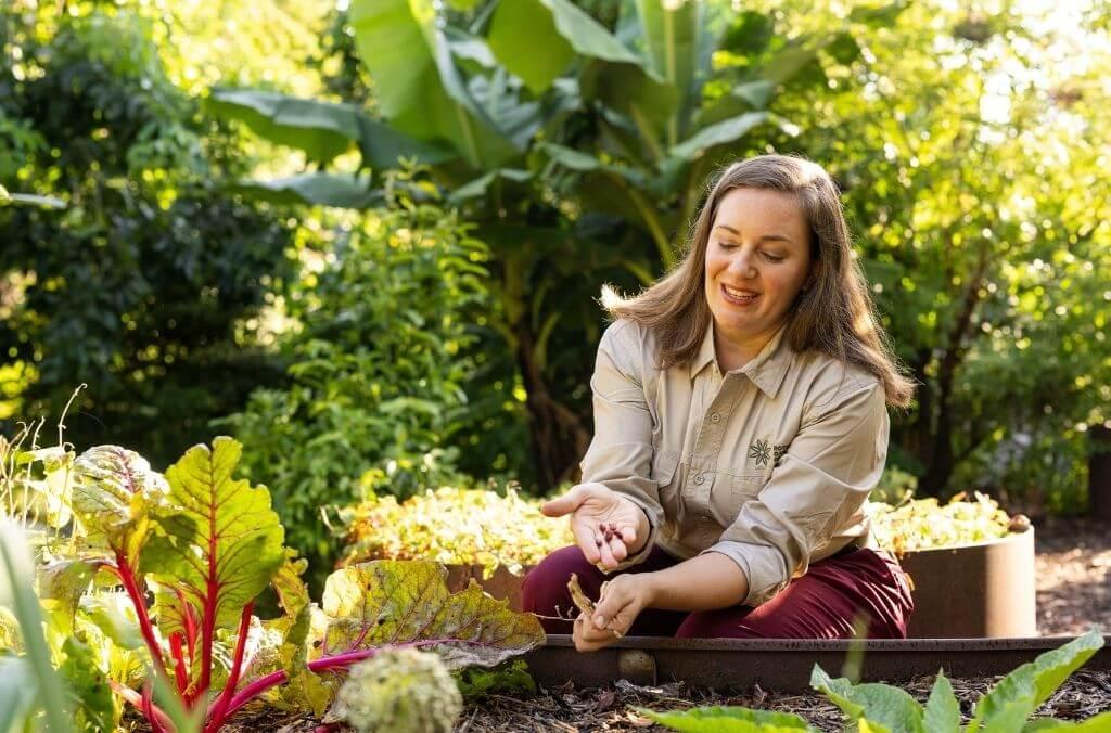 Adina Oosterwijk working in a garden bed